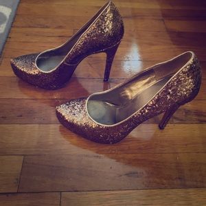Beautiful BCBG Max Azria gold glitter pumps.